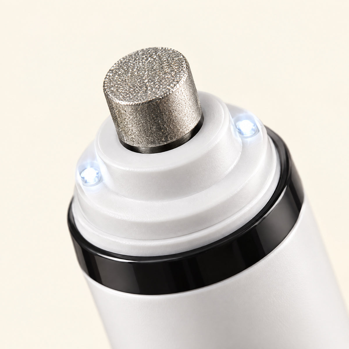 Close-up of the diamond sanding drum with an LED on each side