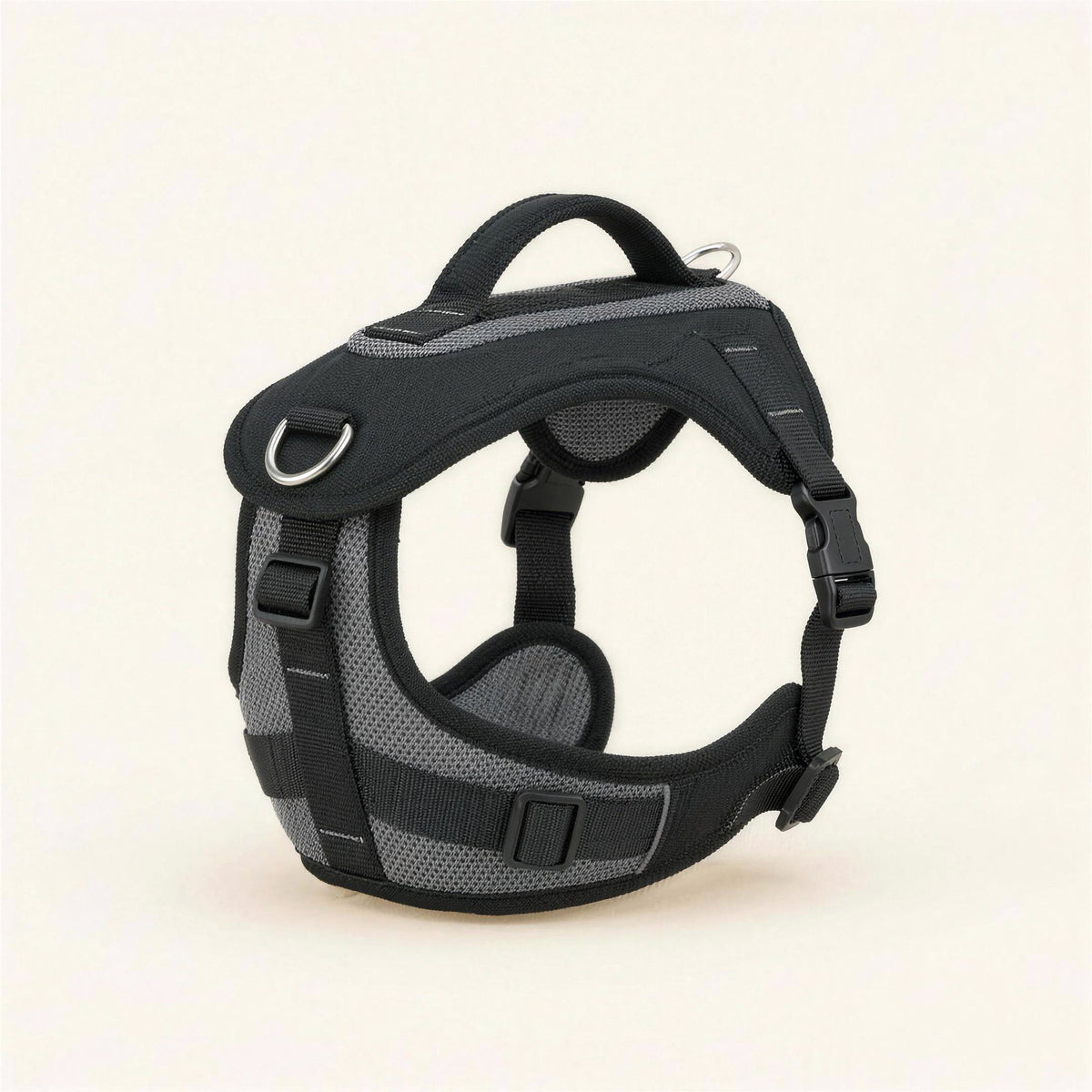 BerraPaws No-Pull Harness in Ink, three-quarter view, showing the padded chest plate, the chest and back D-rings, the top handle and the reflective stitching.